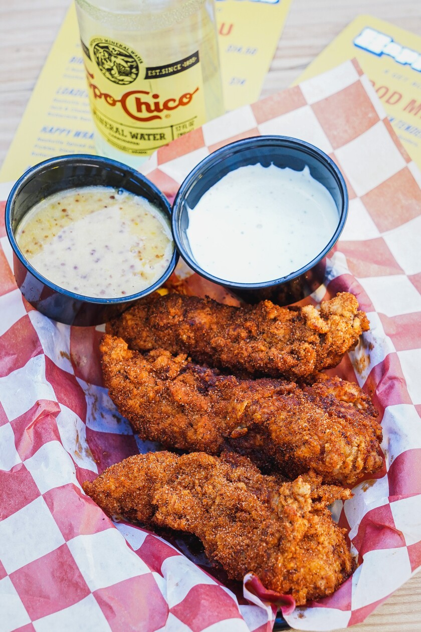 Chicken tenders are the menu specialty at newly opened Happy Does bar in the Gaslamp Quarter.