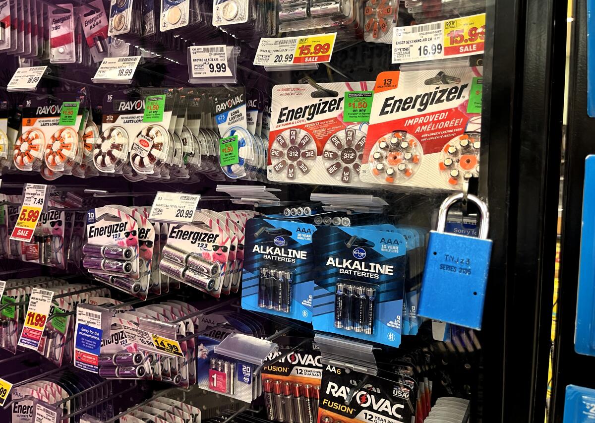 Batteries locked in retail store showcase 