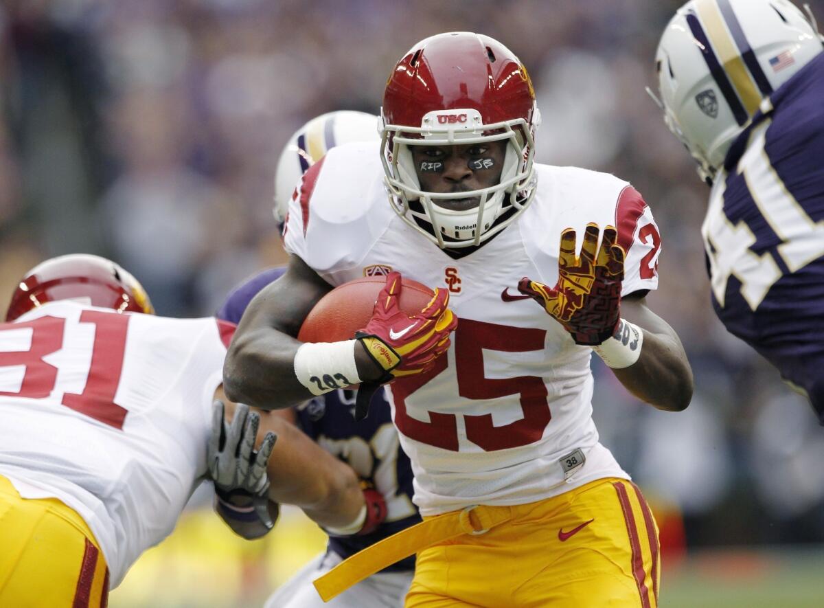 USC running back Silas Redd, who is continuing to recover from knee surgery, might not be healthy enough to play in the Trojans' season opener.
