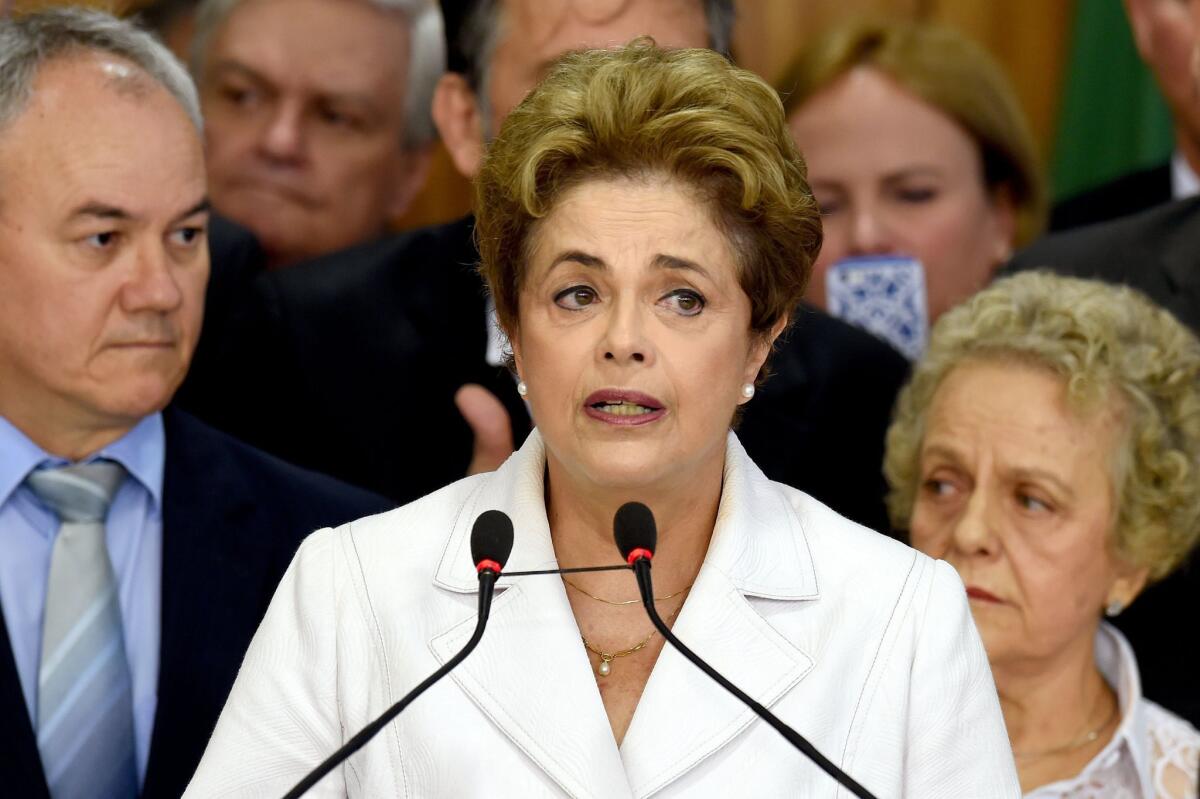 Brazil's suspended President Dilma Rousseff makes a statement at the Planalto Palace in Brasilia on May 12, 2016.