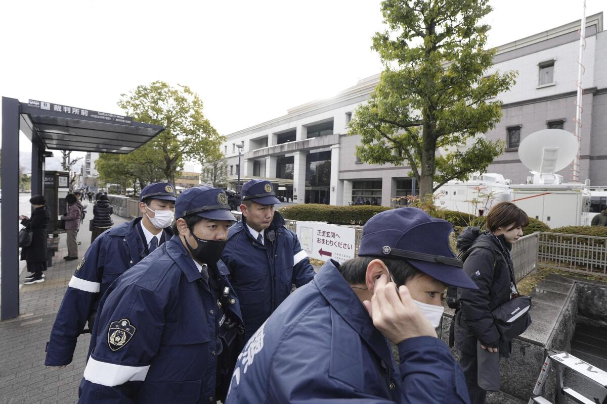 Police officers outside courthouse in Kyoto, Japan