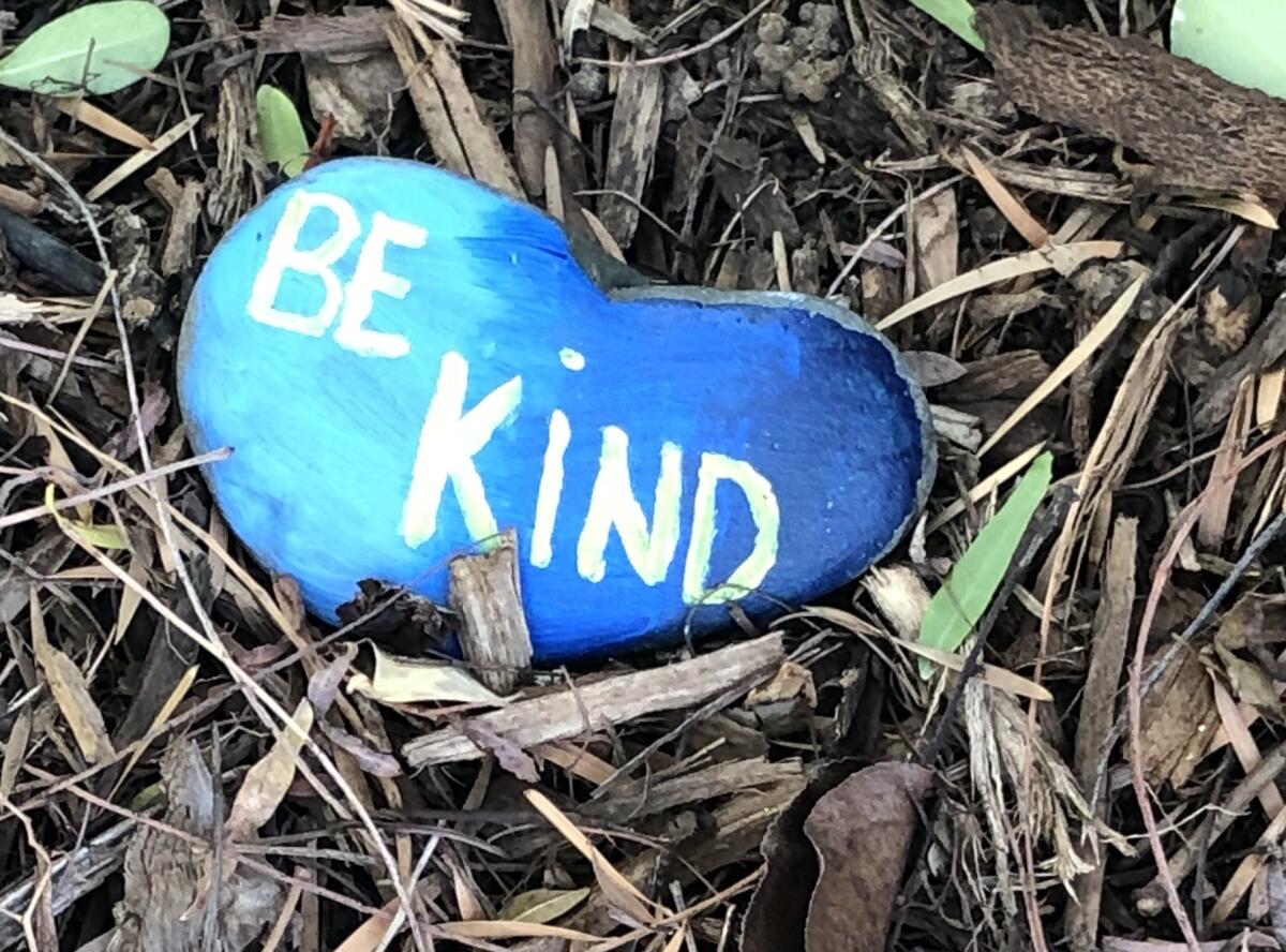 One of the rocks found in a Santa Clarita neighborhood offering a kind message.