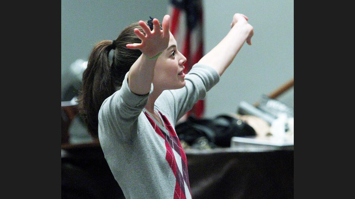 New Assistance League of Flintridge drama director Katelyn Fike works with her young child actors through the end of a a scene at rehearsal.