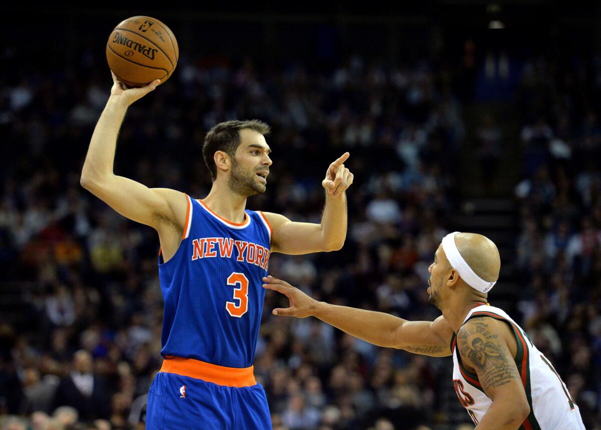 Knicks guard Jose Calderon points out instructions earlier in the year. Calderon hit a big three-pointer late in the game to seal the victory to snap a 16-game losing streak.