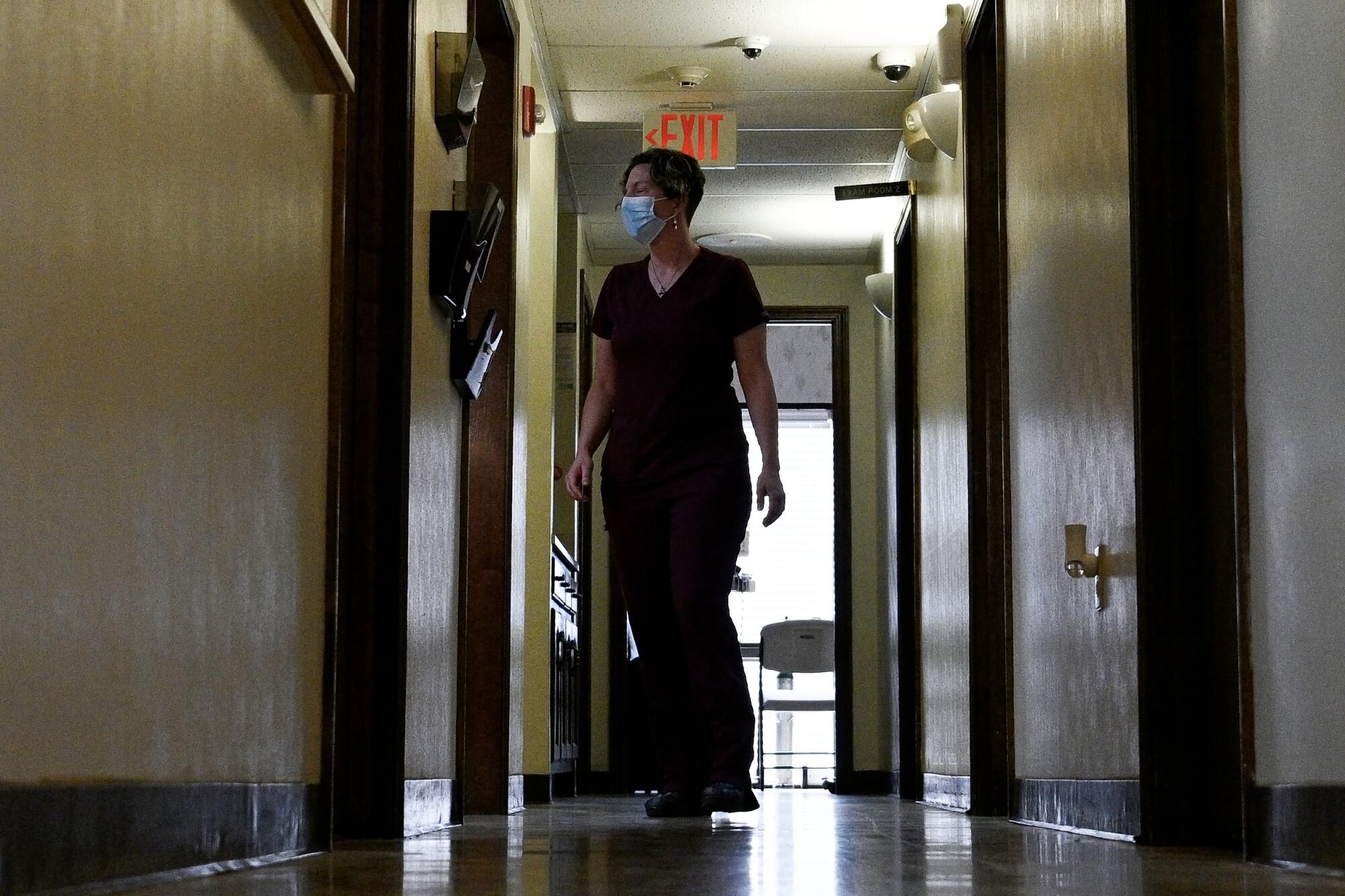 Dr. Leah Torres walks through the hallways at the West Alabama Women's Center