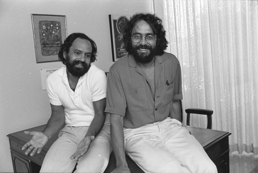 Actors Cheech Marin, left, and Tommy Chong in an executive office at Universal Studios.