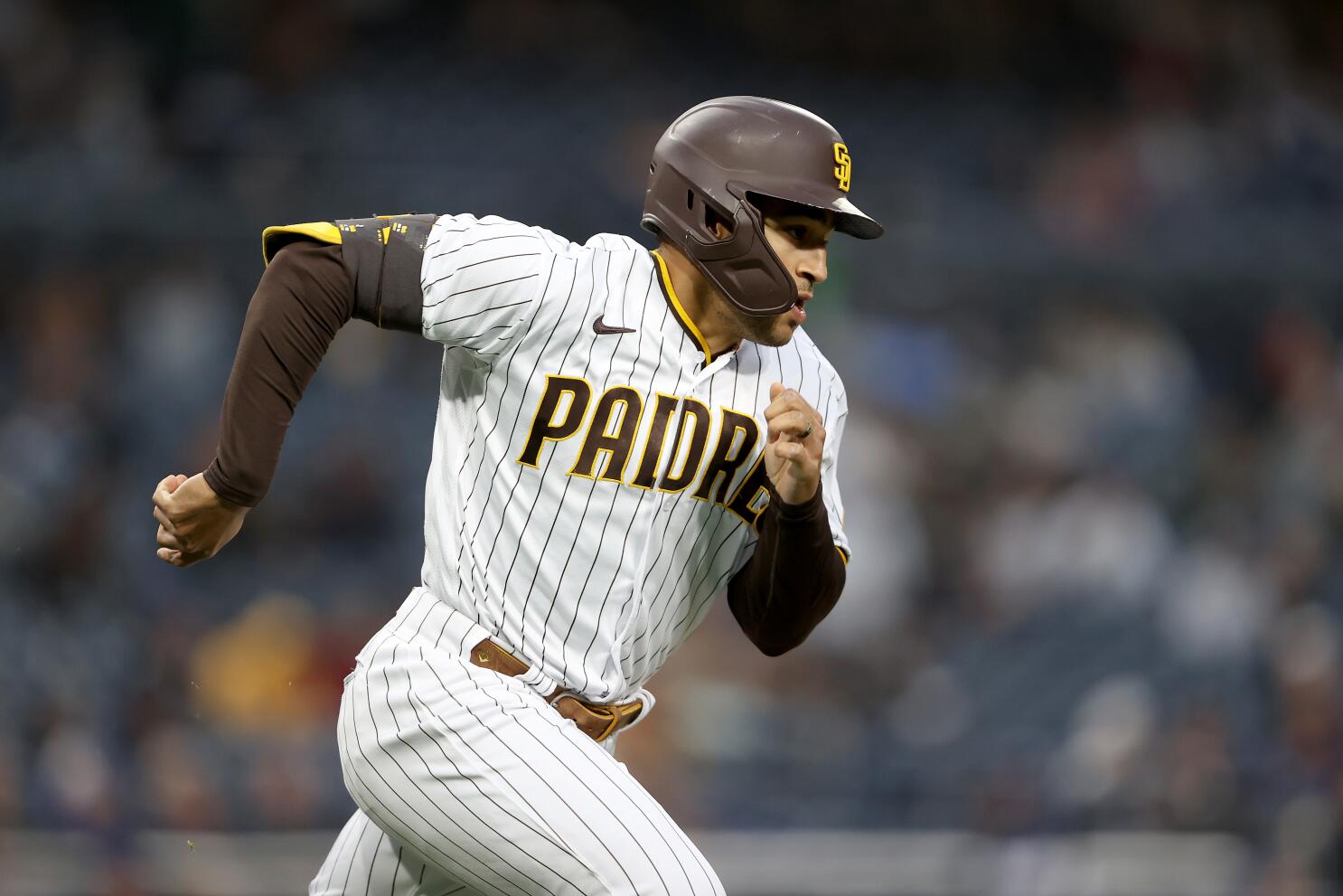 Christian Yelich of the Milwaukee Brewers flips his bat after being News  Photo - Getty Images