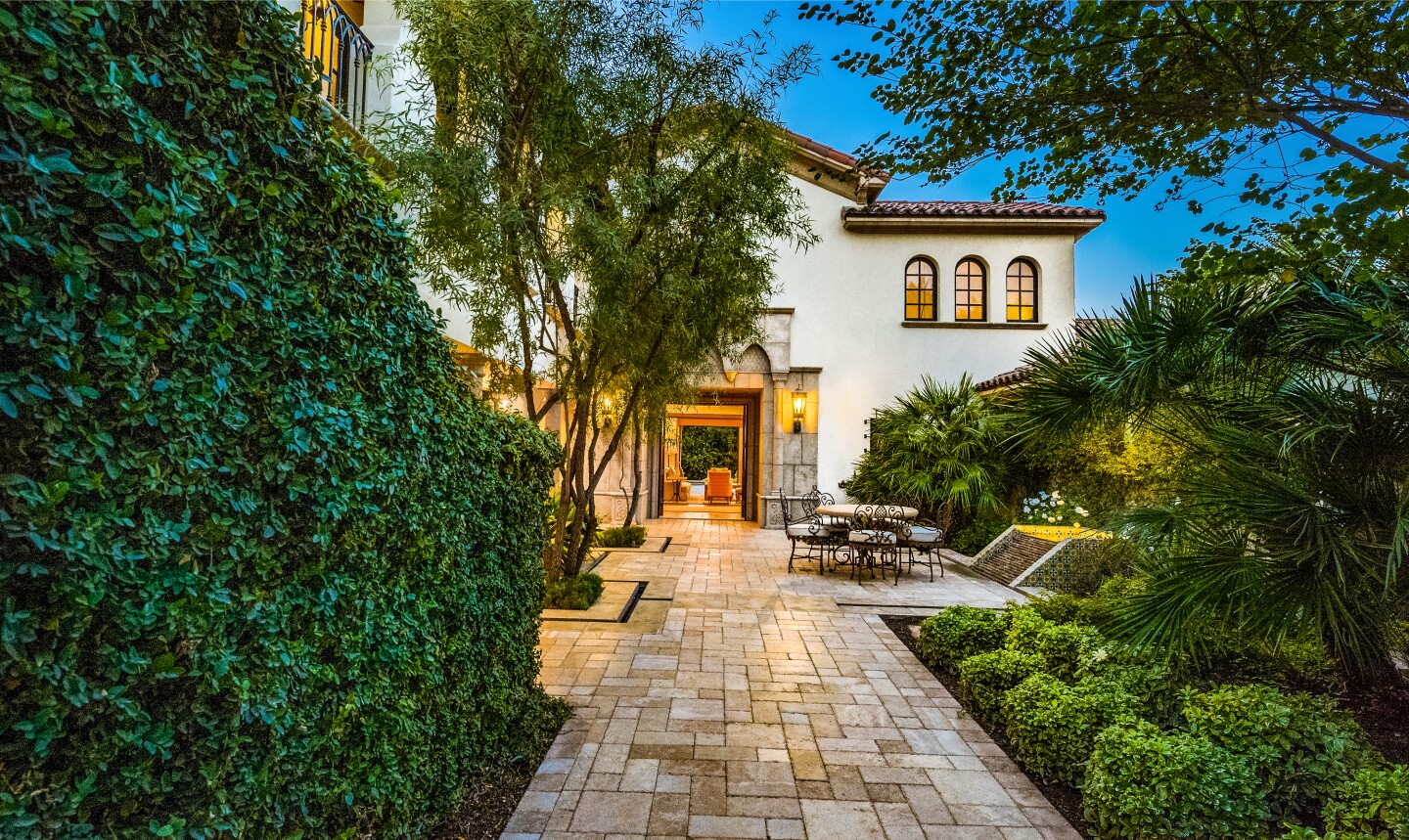 The Mediterranean villa is found in La Quinta's exclusive Madison Club community.