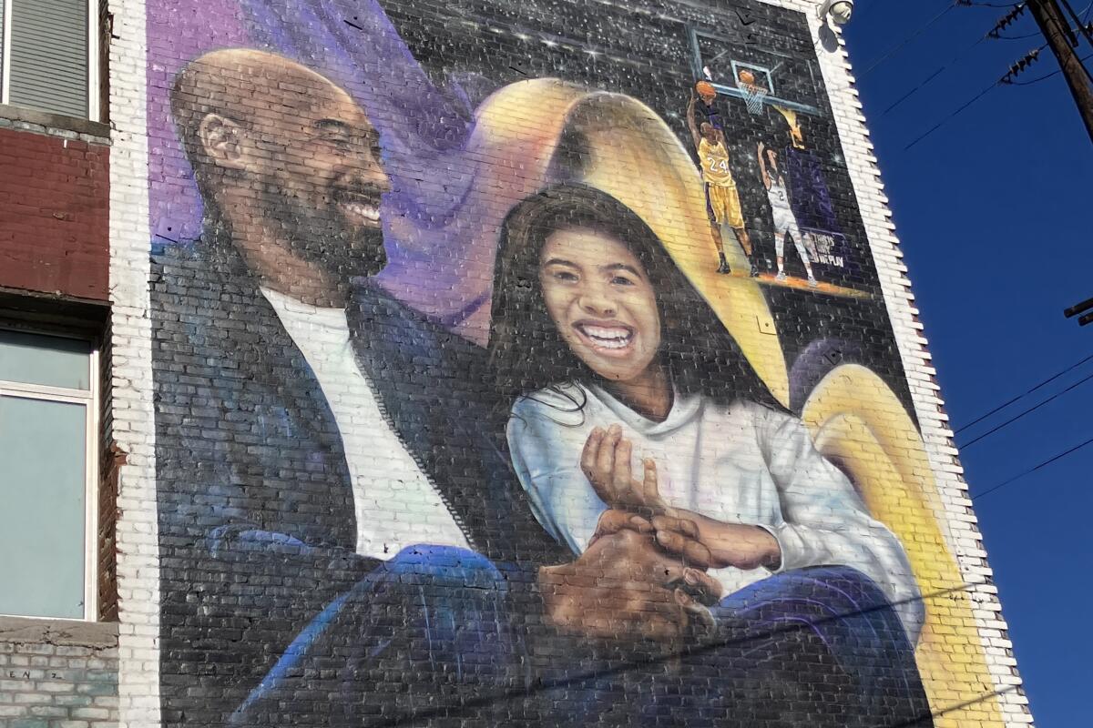 A mural in downtown Los Angeles pays tribute to Kobe and Gianna Bryant.