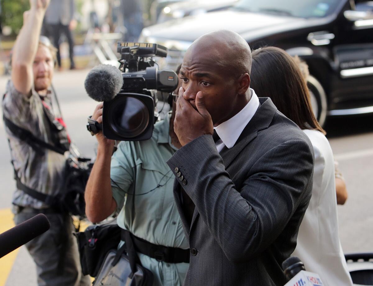 Minnesota Vikings running back Adrian Peterson arrives at court in Conroe, Texas, on Oct. 8.