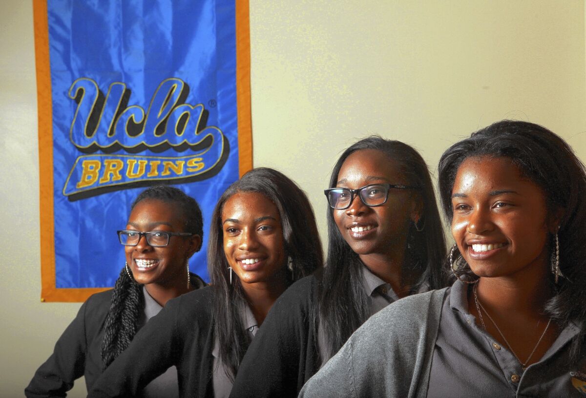Raven Tripplett, left, Sabrina Montgomery, Melissa Alvarez and Jahmia Edwards -- seniors at Alliance William & Carol Ouchi High School in South Los Angeles -- have all been accepted by UCLA.