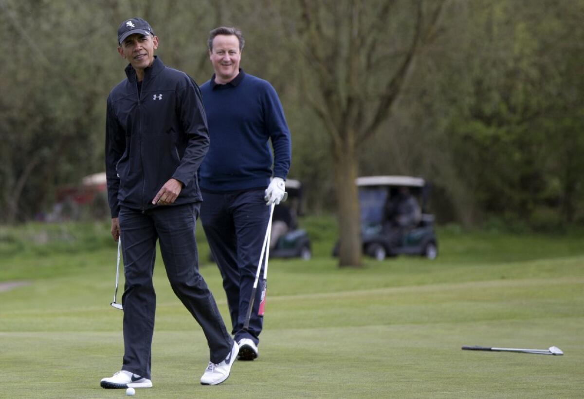 President Obama wears an Under Armour jacket while he and British Prime Minister David Cameron play at the Grove Golf Course in Hertfordshire, England, on April 23.