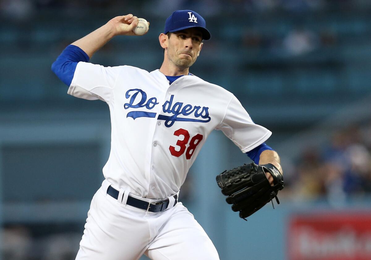 Dodgers starter Brandon McCarthy made major league history by striking out 10 batters with no walks, but also giving up four homers.