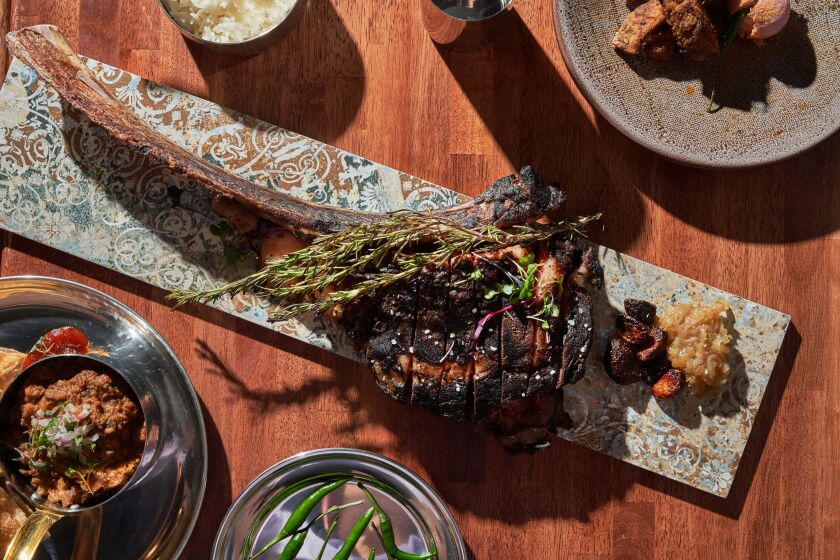 Khan Saab chef wanted to provide the highest-end halal steak for his customers, so their woodfired bone-in tomahawk steak is Australian Wagyu beef, served with whole roasted garlic, caramelized onions and rosemary, and it costs $150.