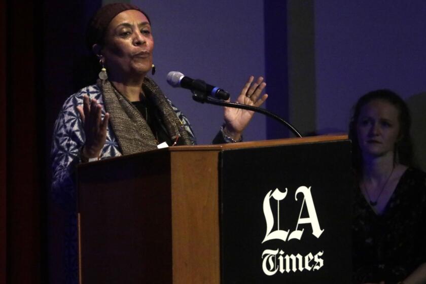 Los Angeles, CA - LOS ANGELES, CA - APRIL 22, 2022 - - Veronique Tadjo, winner of the Fiction award for, "In the Company of Men,"at the the Los Angeles Times Book Prizes show in the Bovard Auditorium at USC on April 21, 2022. (Genaro Molina / Los Angeles Times)