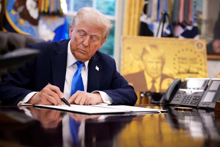 Trump signed a series of executive orders establishing the “Trump Gold Card” and introducing a $100,000 fee for H-1B visas. Photographer: Andrew Harnik/Getty Images