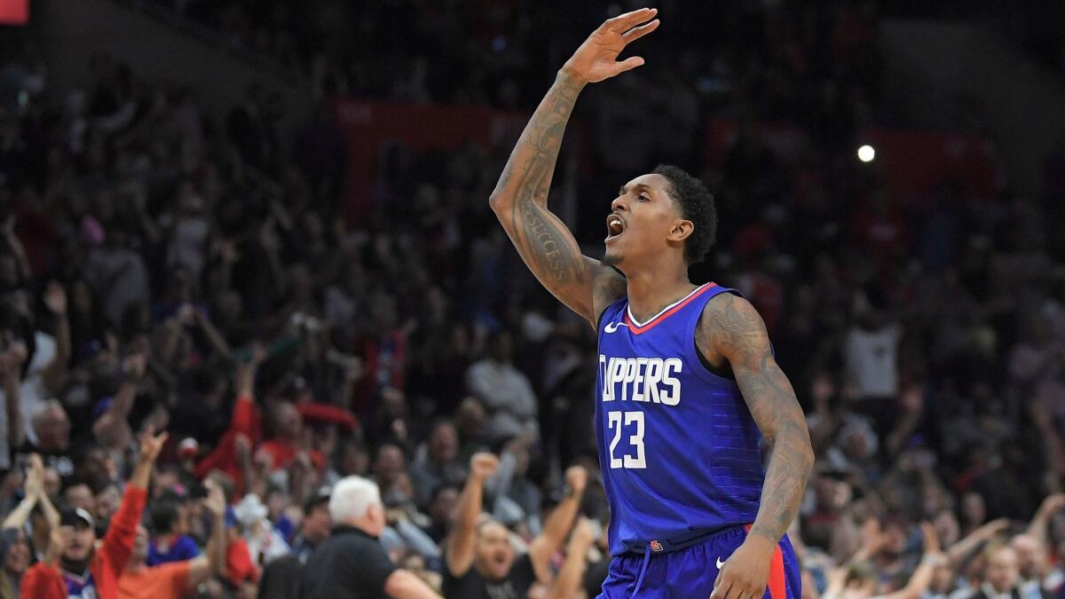 Clippers guard Lou Williams celebrates after scoring against the Washington Wizards on Dec. 9.