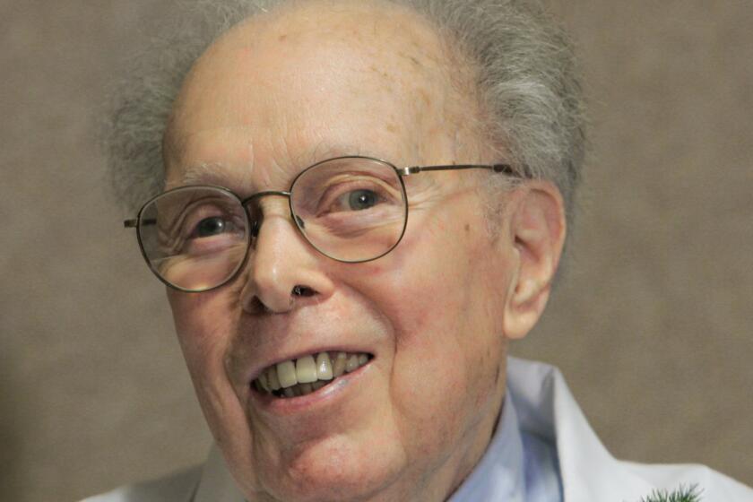 Dr. Denham Harman, pictured at his 90th birthday party in 2006, developed the most widely accepted theory on aging that's used to study cancer and other diseases.