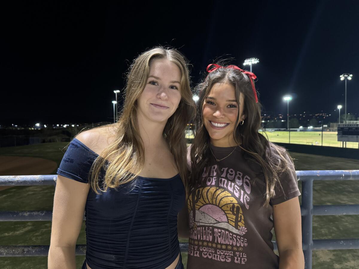 Swimmer Teagan O'Dell, left, and softball outfielder Jillian Torres of Santa Margarita High pose for a photo.
