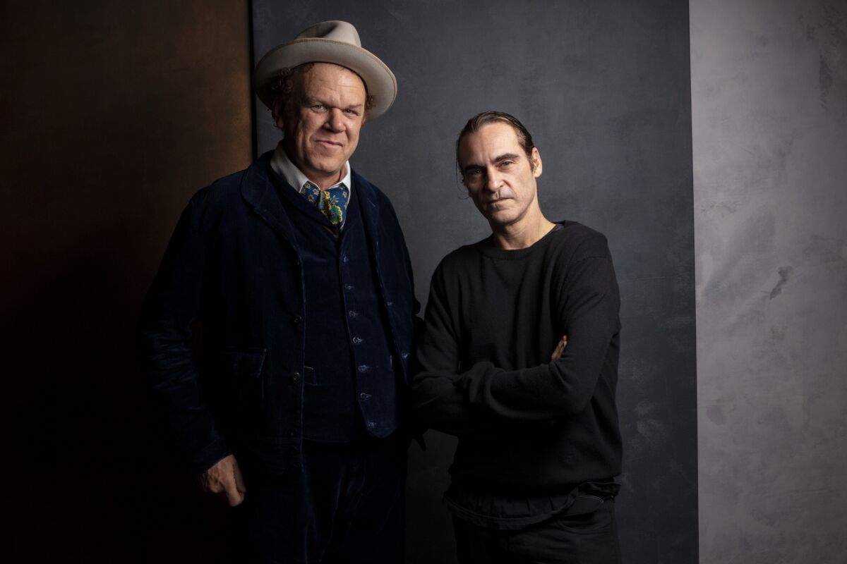 Actor/producer John C. Riley, left, and actor Joaquin Phoenix from the film "The Sisters Brothers."