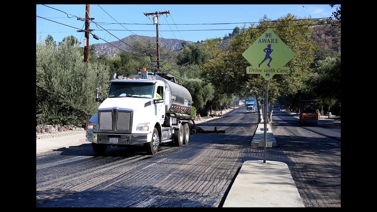 Photo Gallery: Paradise Canyon Elementary streets get new asphalt for new school year