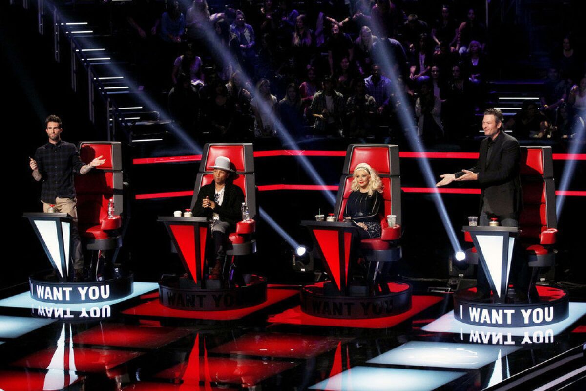 Adam Levine, Pharrell Williams, Christina Aguilera and Blake Shelton in the premiere of Season 8 of "The Voice."