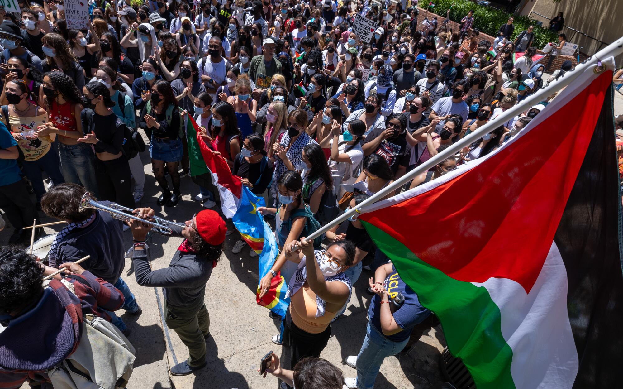 Pro-Palestinian demonstrators hold a student- faculty rally at Dickson Plaza on the UCLA campus on April 29.