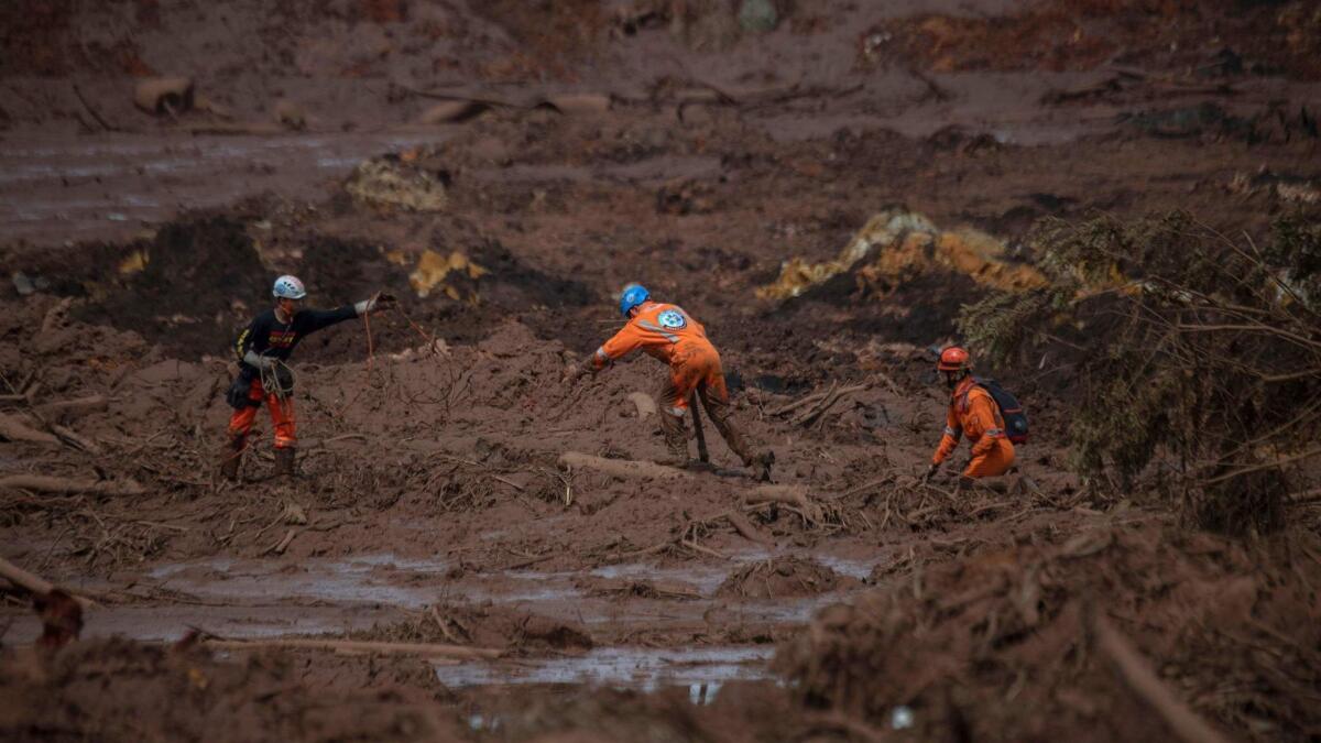 Rescuers in Brazil search for victims in the mud-hit community of Casa Grande on Jan. 27, 2019. A dam at an iron ore mine belonging to the mining company Vale collapsed two days earlier near the southeastern town of Brumadinho.