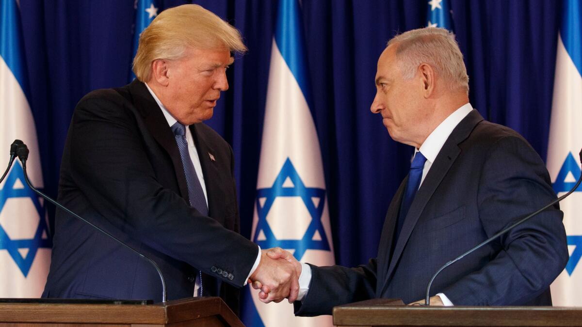 President Trump shakes hands with Israeli Prime Minister Benjamin Netanyahu in Jerusalem on May 22.