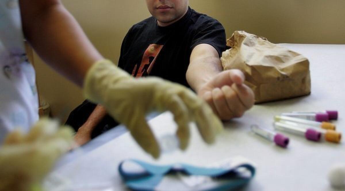 A patient undergoes HIV testing in Los Angeles County.
