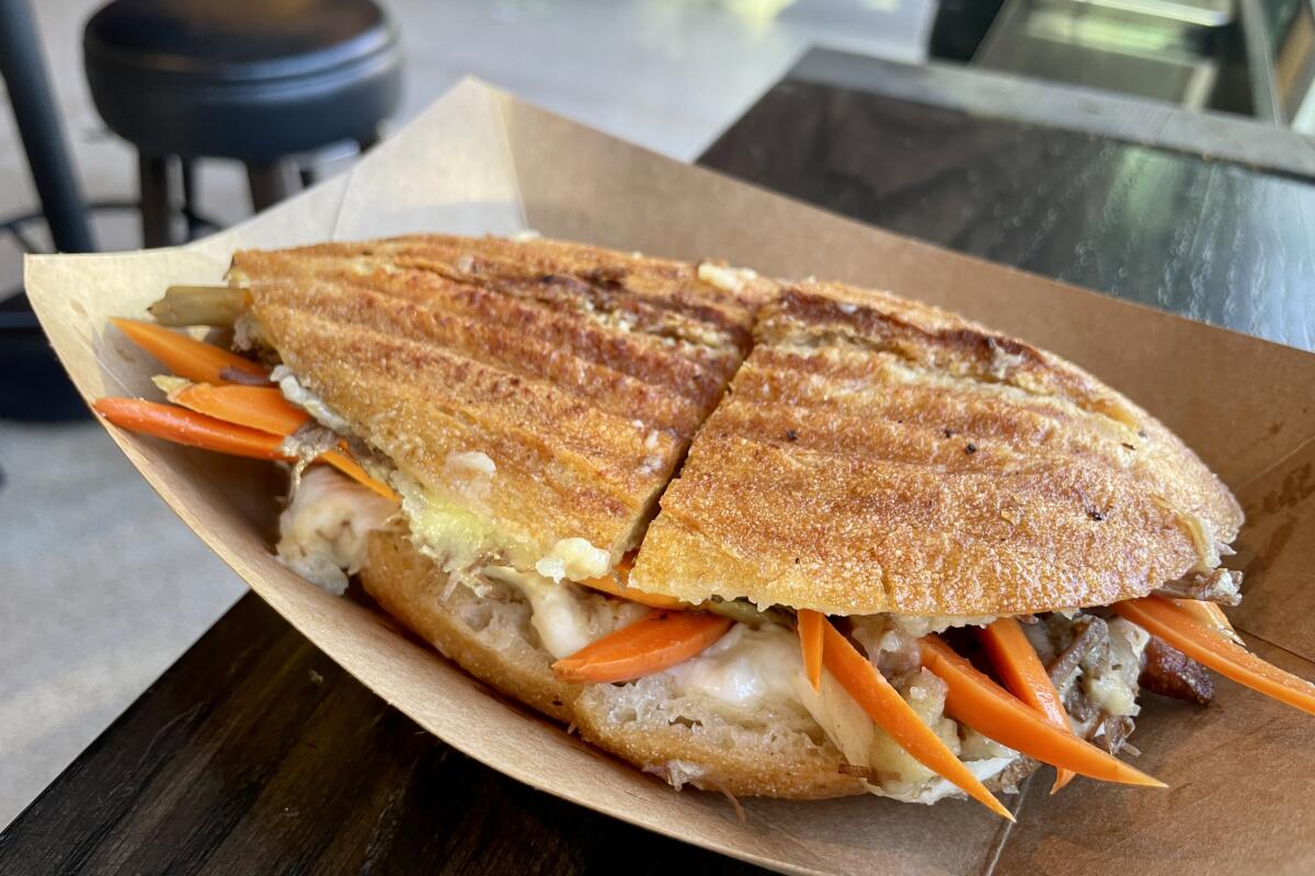 The beef Bourguignon torta in a cardboard container