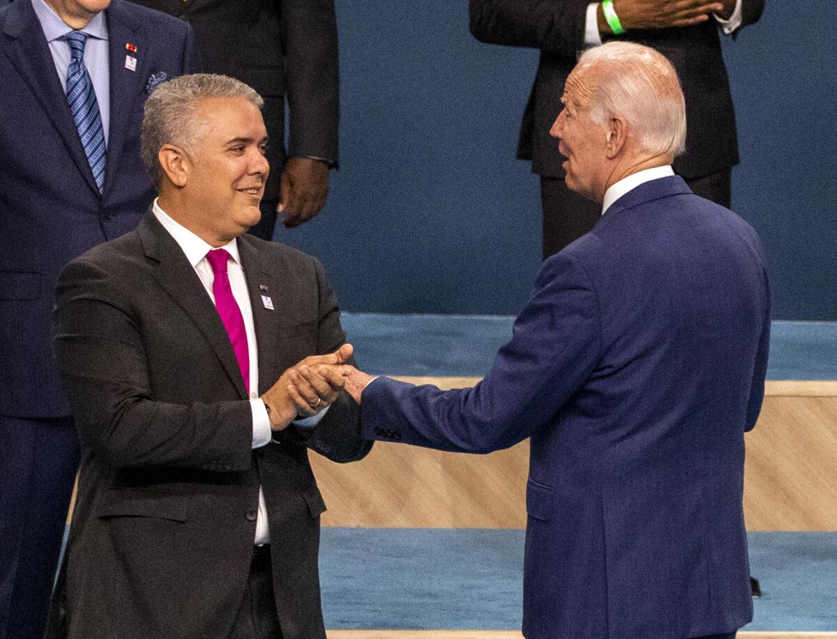 President of Colombia Ivan Duque Marquez US President Joe Biden, speaking following the group photo of leaders.