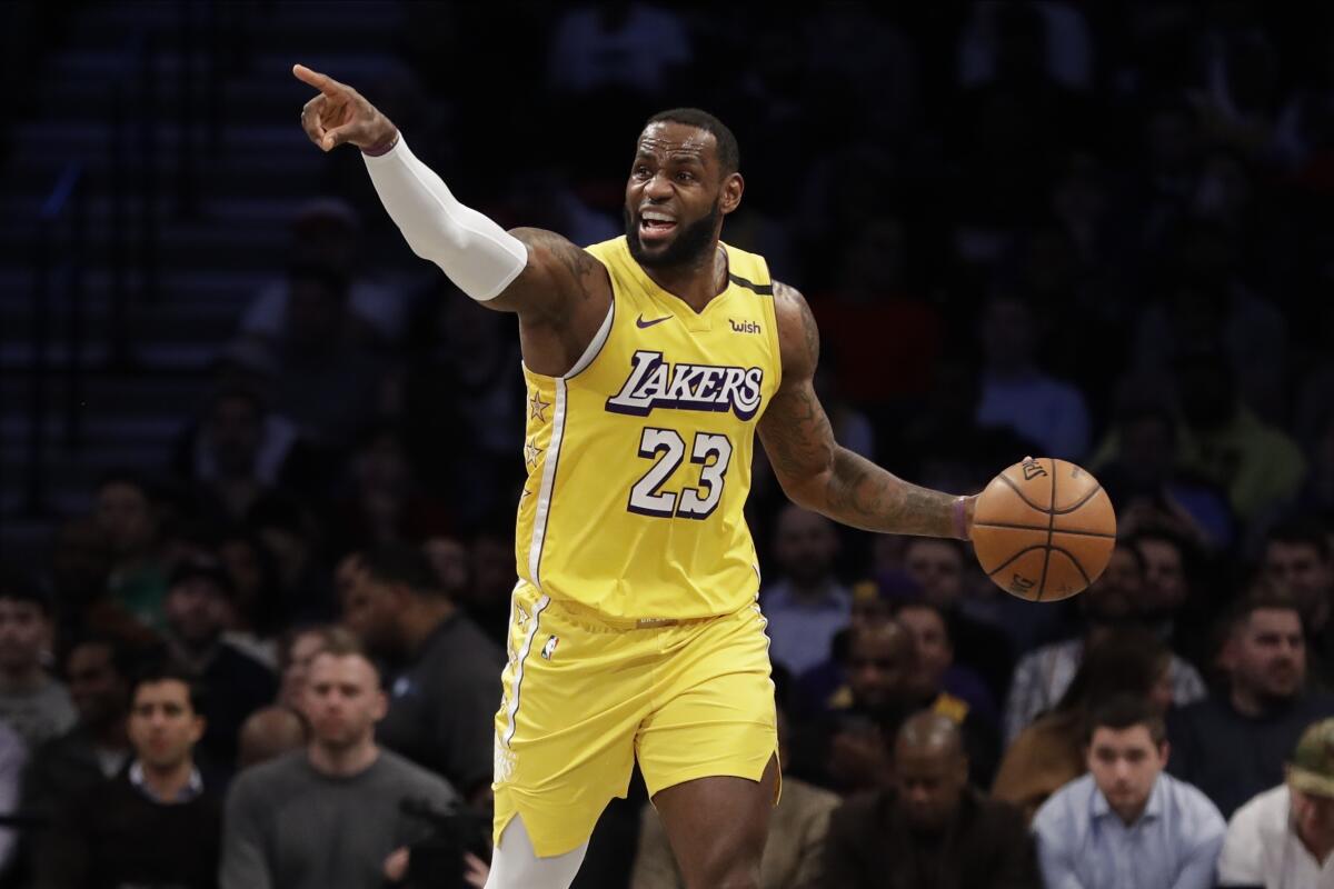 Lakers forward LeBron James sets up the offense during a game against the Nets on Jan. 23, 2020, at Barclays Center in Brooklyn.