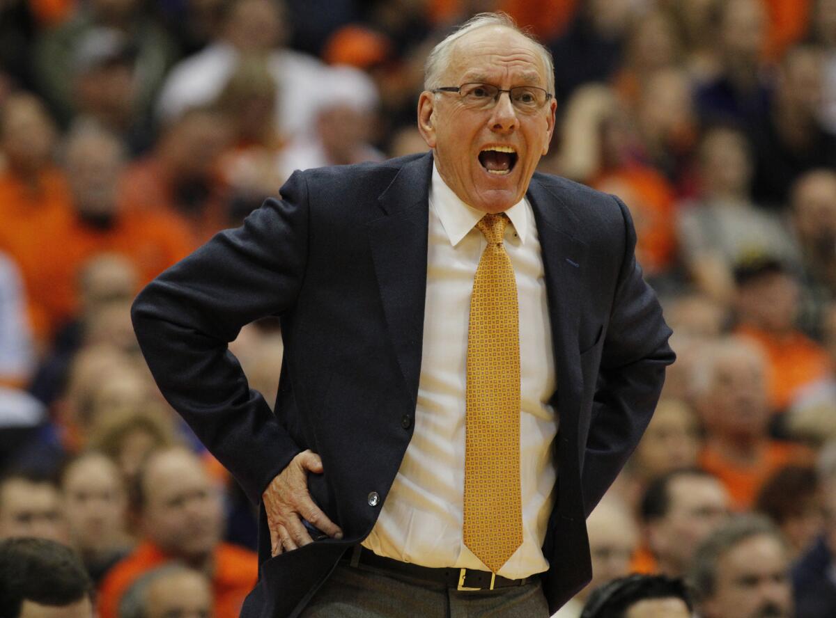 Syracuse Coach Jim Boeheim yells to his players during a game against Wisconsin on Wednesday.