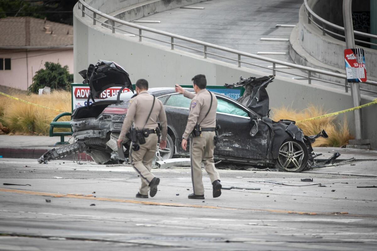 CHP officers at the scene of the Windsor Hills crash.