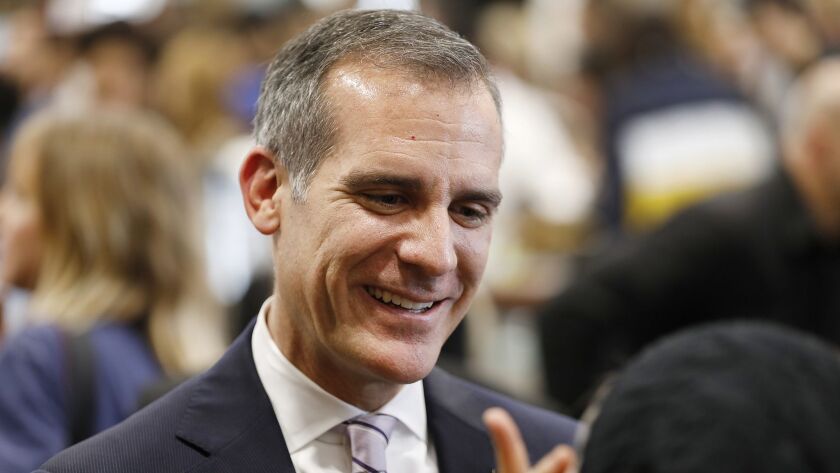 Mayor Eric Garcetti speaks with attendees after an event in Playa Vista, Calif. on Jan. 16.