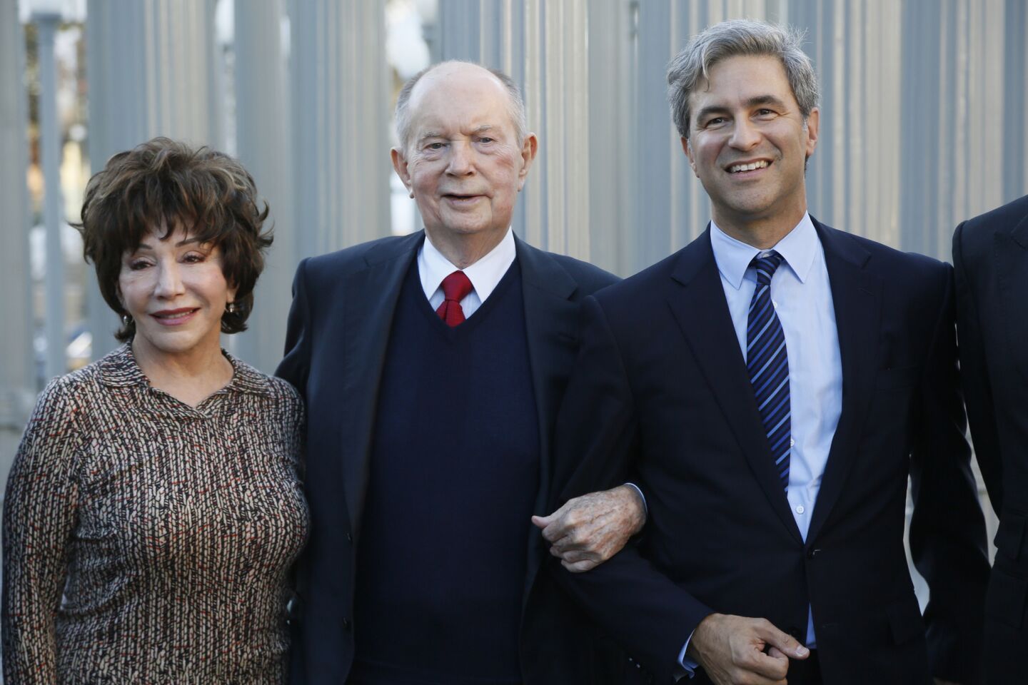 Los Angeles County Museum of Art trustee Lynda Resnick, left, Jerry Perenchio and LACMA CEO Michael Govan arrive at a news conference at LACMA in 2014 to announce Perenchio's bequest of artwork.