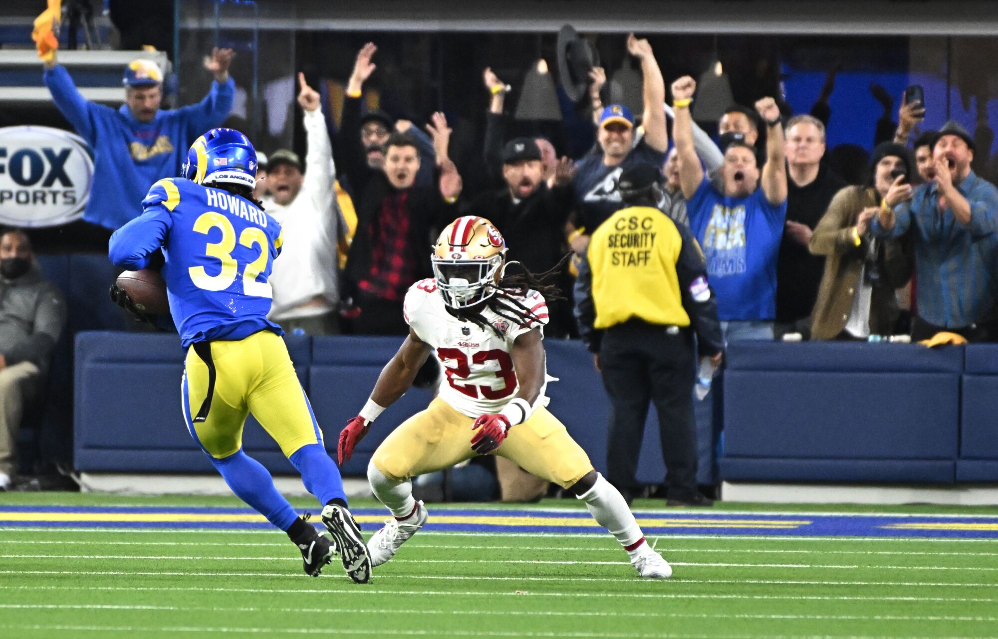 Rams linebacker Travin Howard intercepts the ball after it bounced off the hands of 49ers running back JaMycal Hasty.