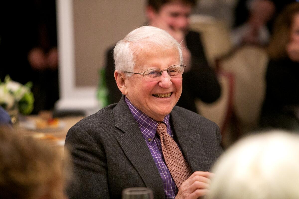 Gordon Rogoff smiles at his retirement celebration at the Yale Club of New York in 2019.