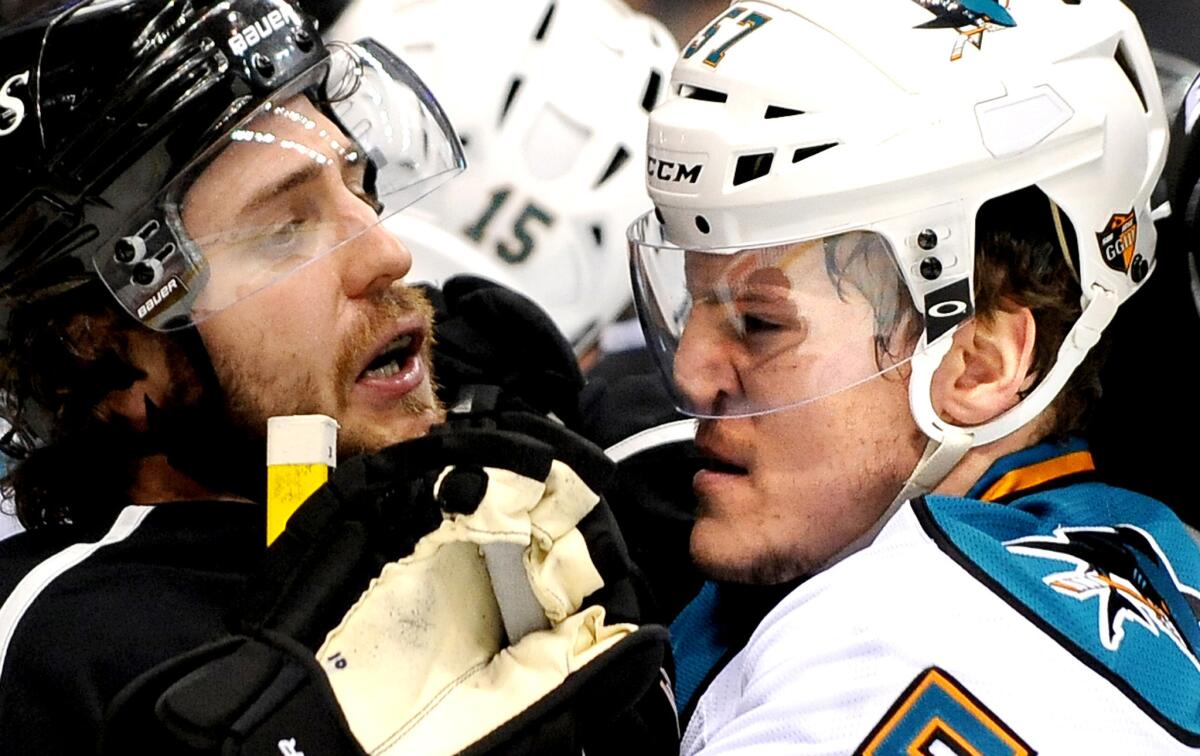 Kings' Mike Richards and Sharks' Tommy Wingels scuffle in the first period of Game 5.