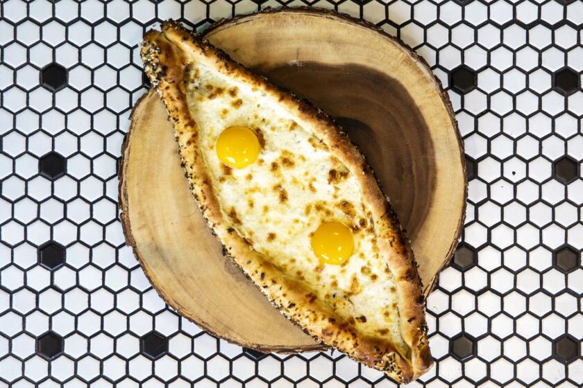 LOS ANGELES, CALIF. - JANUARY 04: Tony Kachapuri's Orginal Khachapuri, a new take traditional Georgian cheese and egg bread, made at Bahn Oui in Hollywood, on Friday, Jan. 4, 2019 in Los Angeles, Calif. (Kent Nishimura / Los Angeles Times)