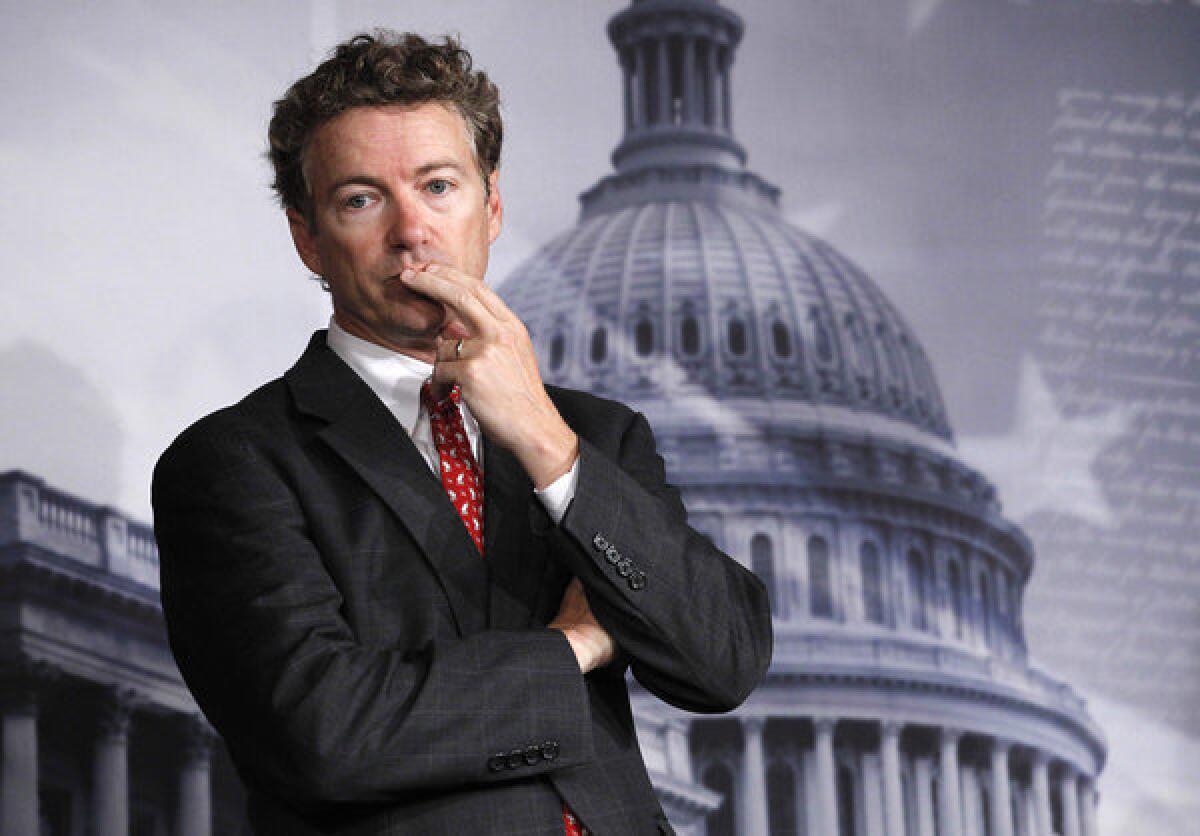 Sen. Rand Paul (R-Ky.) listening to a question during a news conference on Capitol Hill.