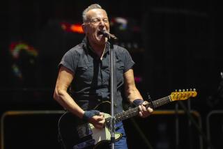 FILE - Bruce Springsteen and the E Street Band perform on Wednesday, Aug. 9, 2023, at Wrigley Field in Chicago. Springsteen and the E Street Band’s 2023 tour will be postponed until 2024. (Photo by Rob Grabowski/Invision/AP, File)