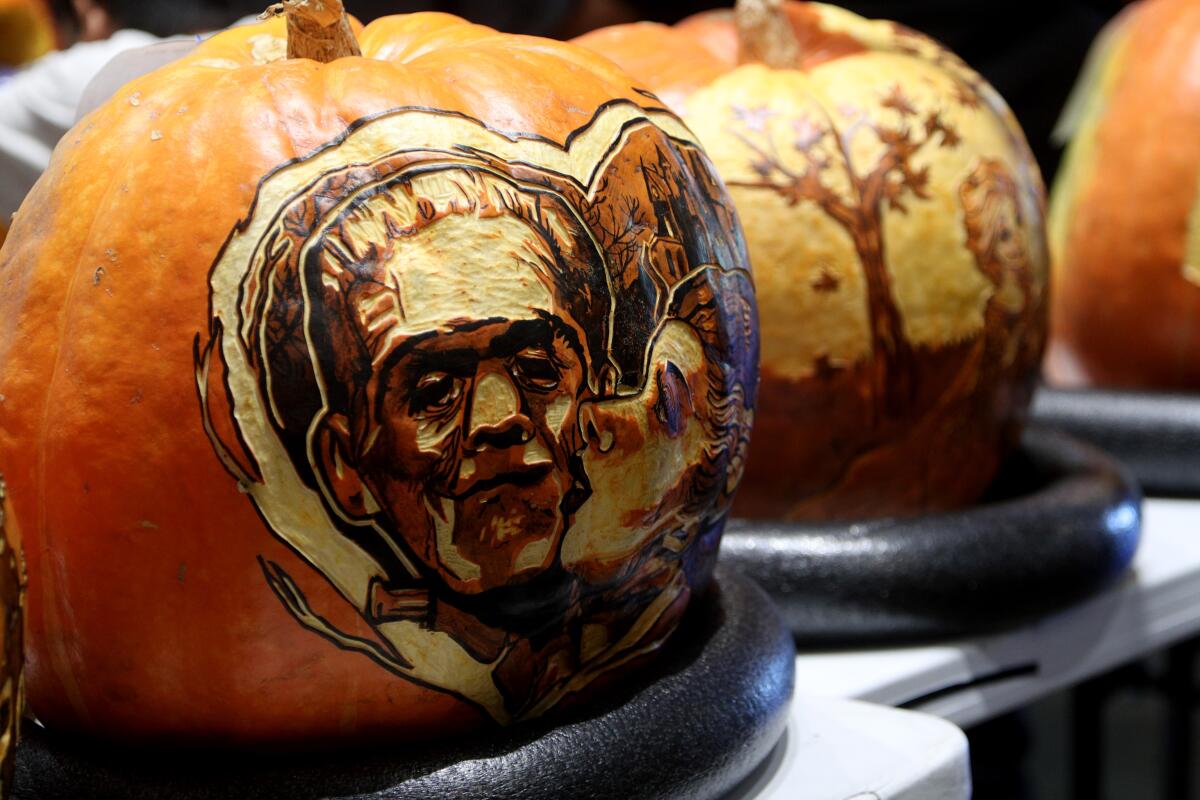 Frankenstein and his bride adorn one of 75 prizewinner pumpkins that will highlight Descanso Gardens' new "Carved" event from Oct. 23 to 27. The nighttime spectacle includes a Pumpkin House and 1,000 hand-carved Jack o' Lanterns.