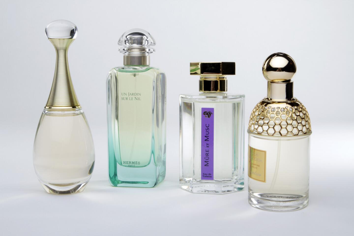 Perfumes J'Adore, from left, Un Jardin Sur Le Nil, Mure et Musc and Aqua Allegoria are among the summer favorites.