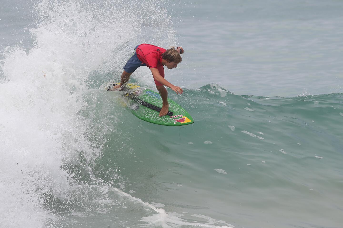 Lucas Fink carves a wall as he competes in the Pro Men division Saturday in the Victoria World Championships of Skimboarding at Aliso Beach in Laguna Beach. He ended up finishing second in the division.