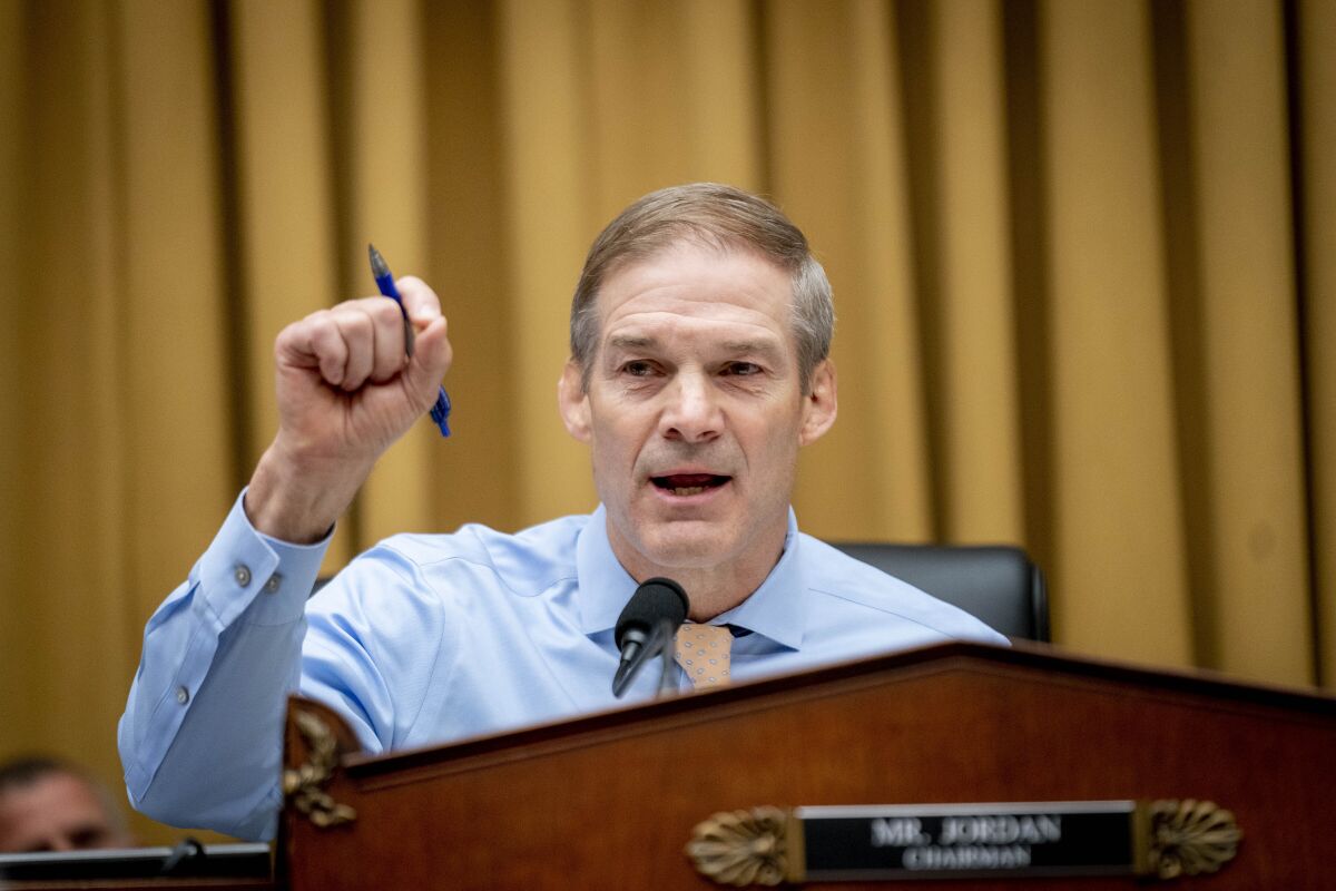 Jim Jordan gestures at a congressional hearing