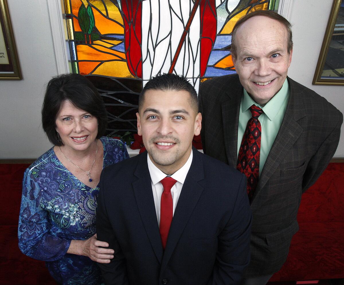 Joseph Cordova, in front, with Cathy Keen, and Dr. Ronald Vandermey, co-Pastor of Bethany Bible Presbyterian Church in Montrose inside the church on Monday, December 23, 2013. About 10 years ago, when Cordova's life was at a low point, Vandermey took him to the USC school of dentistry to have substantial work done on Cordova's teeth. There, he met Keen who has been his mentor and mom ever since, filling a need Cordova had after his parents died, and grandparents neglected.