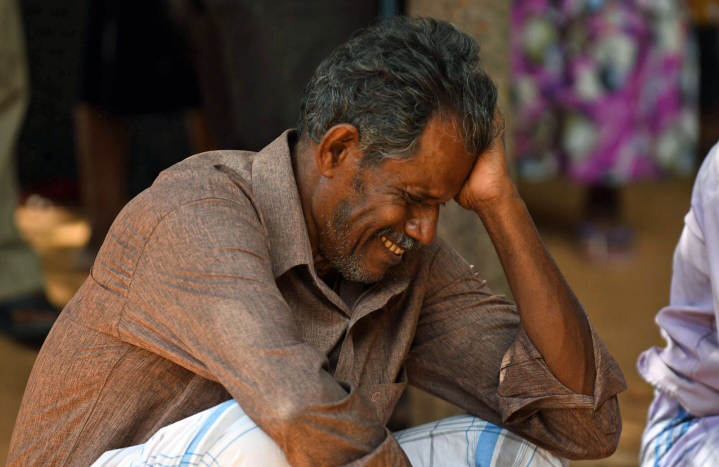 A victim's relative weeps outside a hospital in Batticaloa in eastern Sri Lanka after the Easter Sunday bombings.