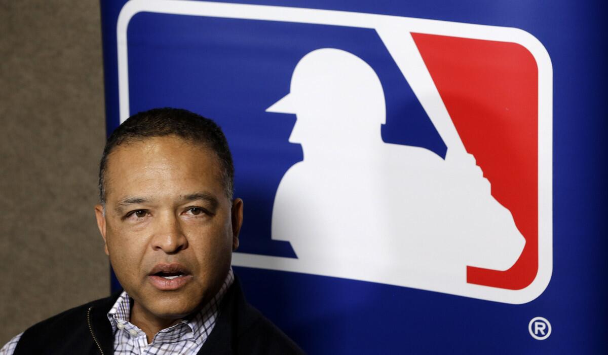Los Angeles Dodgers manager Dave Roberts talks with reporters at the Major League Baseball winter meetings on Monday.